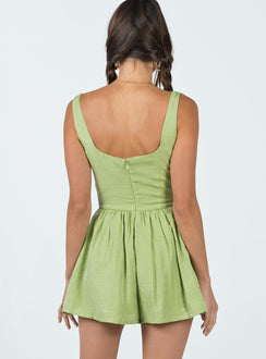 Romper Silky material  Fixed shoulder straps  Gathered waist  Twin hip pockets  Invisible zip fastening at back 