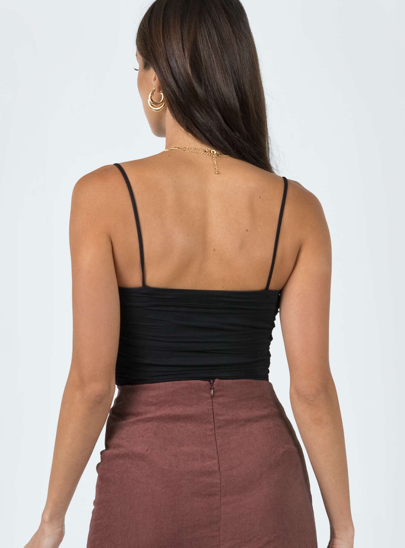 back view of model wearing Princess Polly Cinzia Bodysuit Black Sleeveless Square Neck 