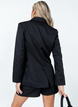 Black blazer Lapel collar  Padded shoulders  Button front fastening  Twin hip pockets 