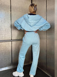 Front view of model wearing  front Princess Polly High Waisted Pants High Waisted Pants High Waisted Pants High Waisted Pants  Arya Straight Leg Track Pants Baby Blue