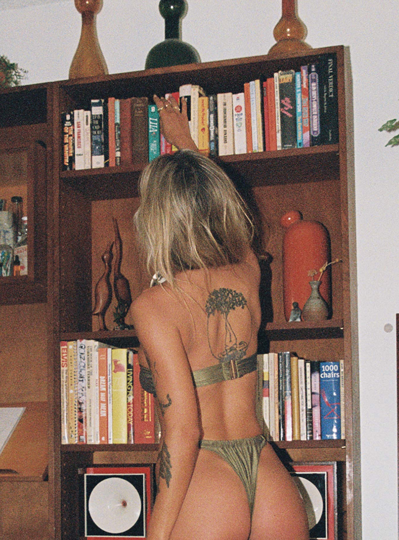 Bikini top Bandeau style Silver toned ring at bust Adjustable shoulder straps Clasp fastening Unpadded Fully lined