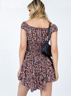 Romper Floral print  Elasticated shoulders  Tie at neckline  Shirred waistband  Layered hem