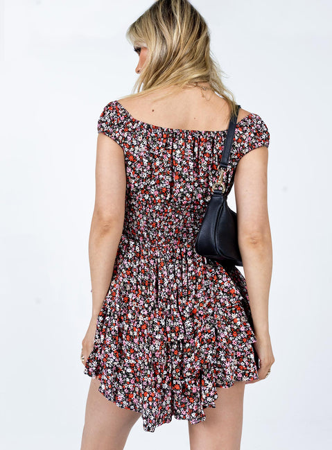 Romper Floral print  Elasticated shoulders  Tie at neckline  Shirred waistband  Layered hem