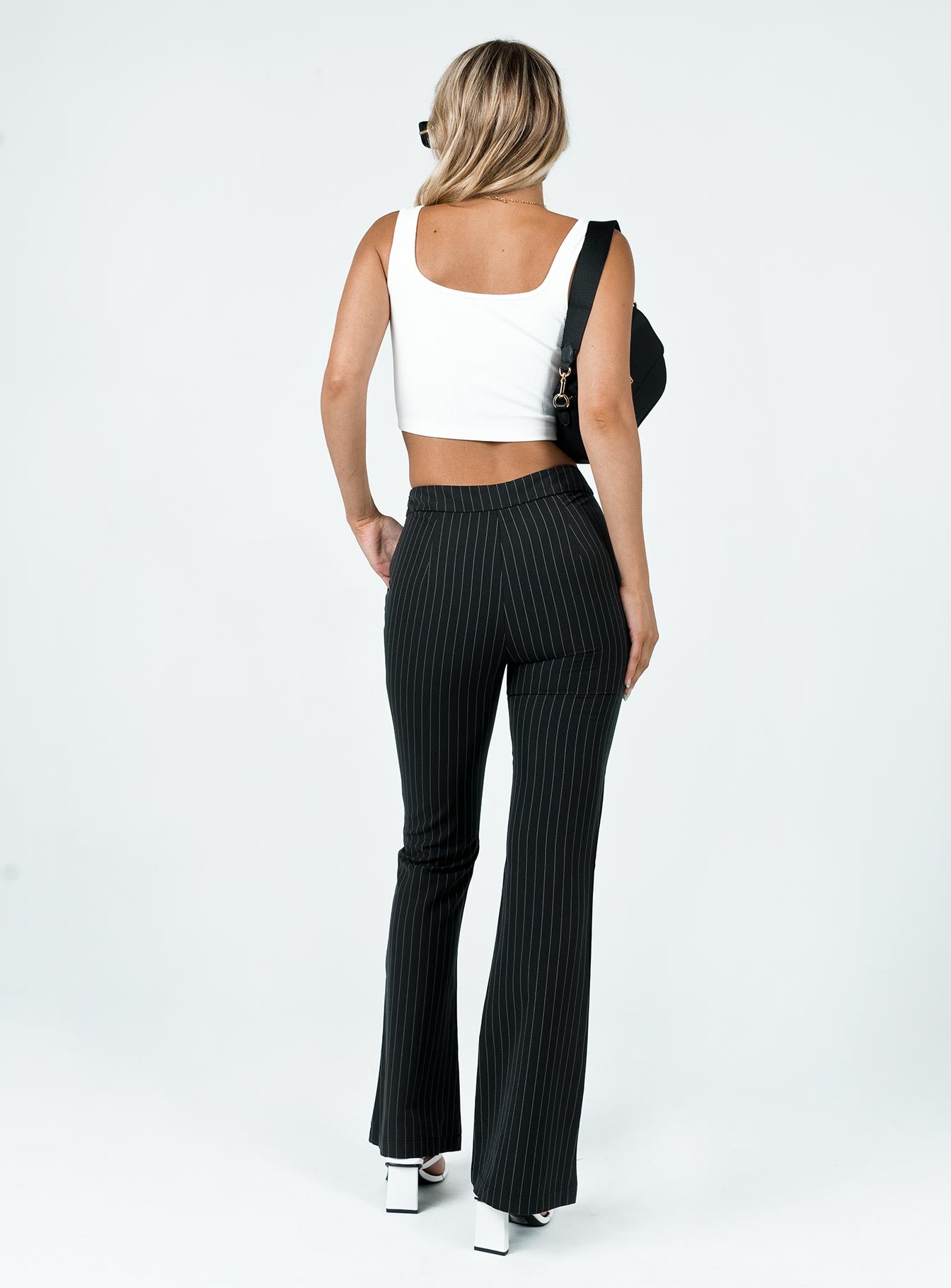 back view of model wearing Princess Polly Meshelle Pants Black 