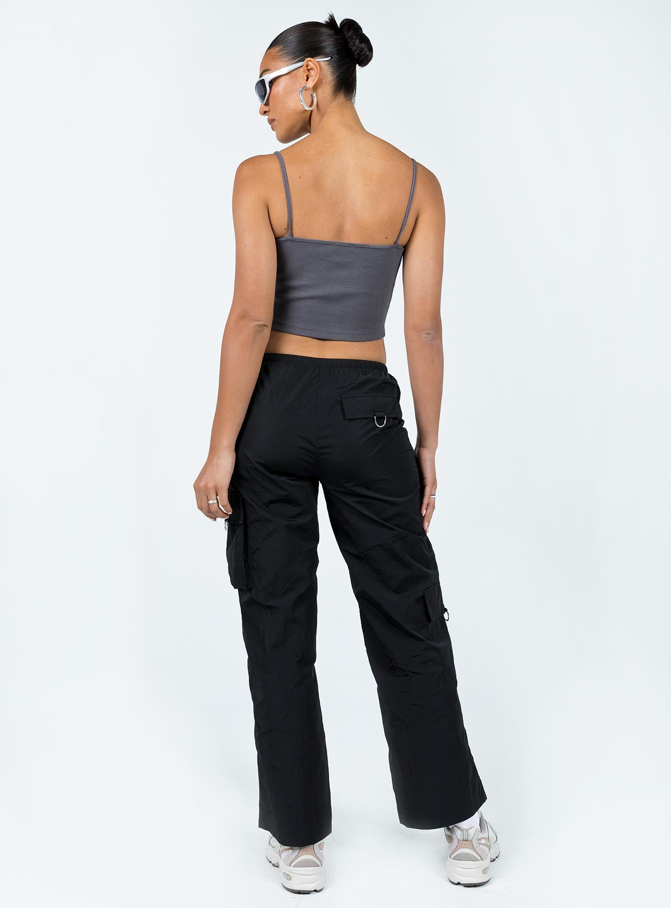 Front view of model wearing  front Princess Polly High Waisted Pants High Waisted Pants High Waisted Pants High Waisted Pants  Fernando Parachute Pants Black
