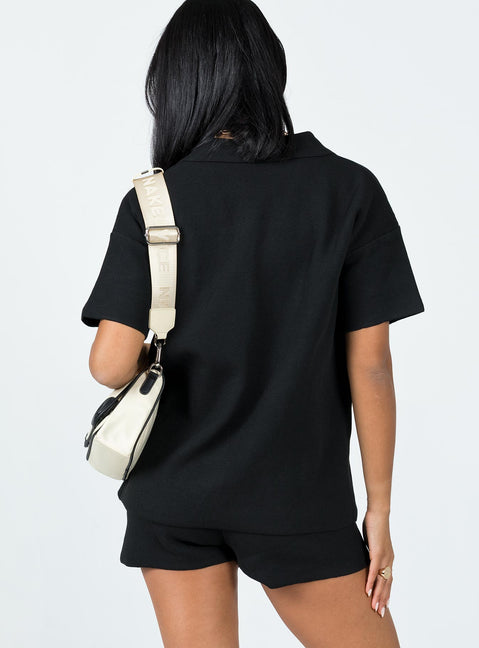 Matching set  Relaxed fit  Princess Polly Exclusive 63% recycled fibers 25% polyester 12% nylon  Soft knit material  V neckline  Button front fastening  High waisted shorts  Elasticated waistband 