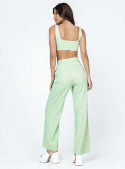 Matching set Crop top Fixed straps Invisible zip fasting at side High waisted pants Wide relaxed leg Belt loops at waist Zip & button fastening Lined top