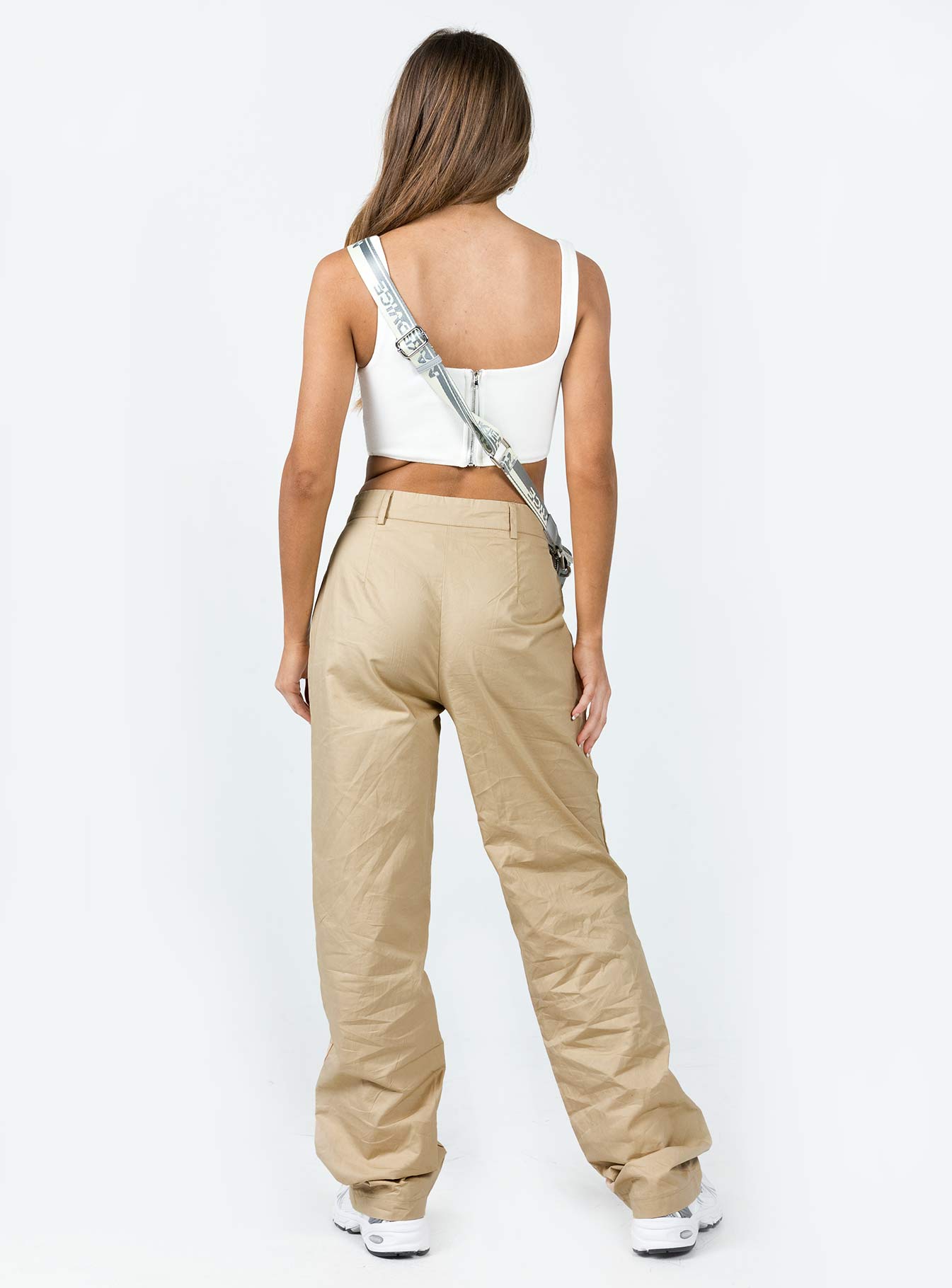 Front view of model wearing  front Princess Polly High Waisted Pants High Waisted Pants High Waisted Pants  Titius Pants Light Beige