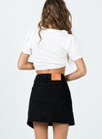 back view of model wearing Princess Polly Banksia Denim Mini Skirt Black Mini Skirts 