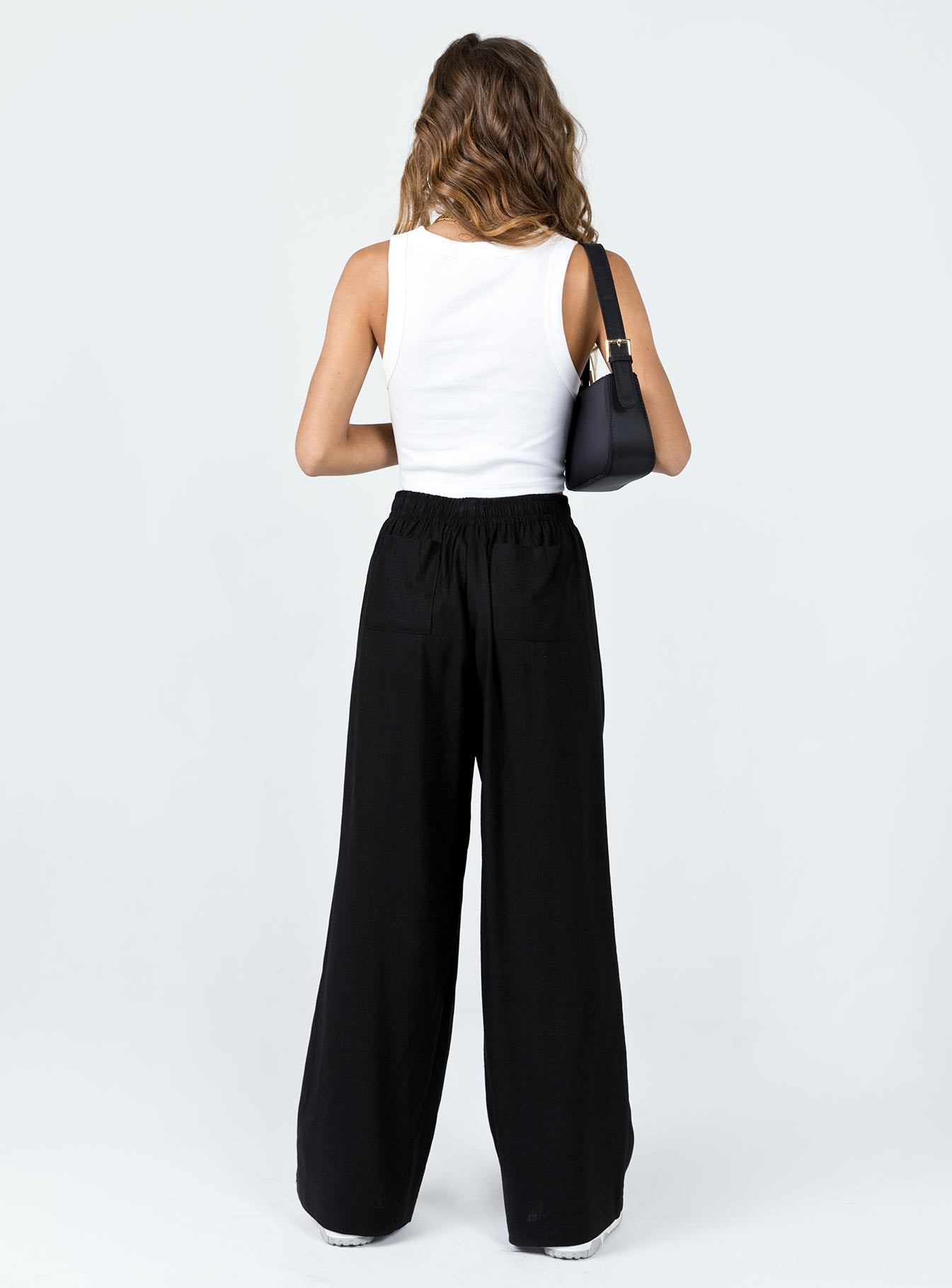 back view of model wearing Princess Polly Louis Linen Blend Pants Black Lower Impact High Waisted Pants 