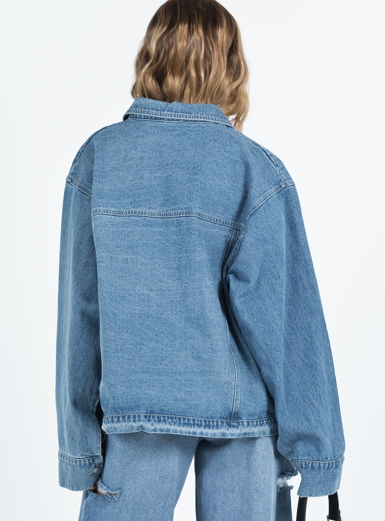 Blue denim jacket Mid wash denim Pointed collar Button fastening at front Twin chest pockets Single button cuff Non-stretch Unlined