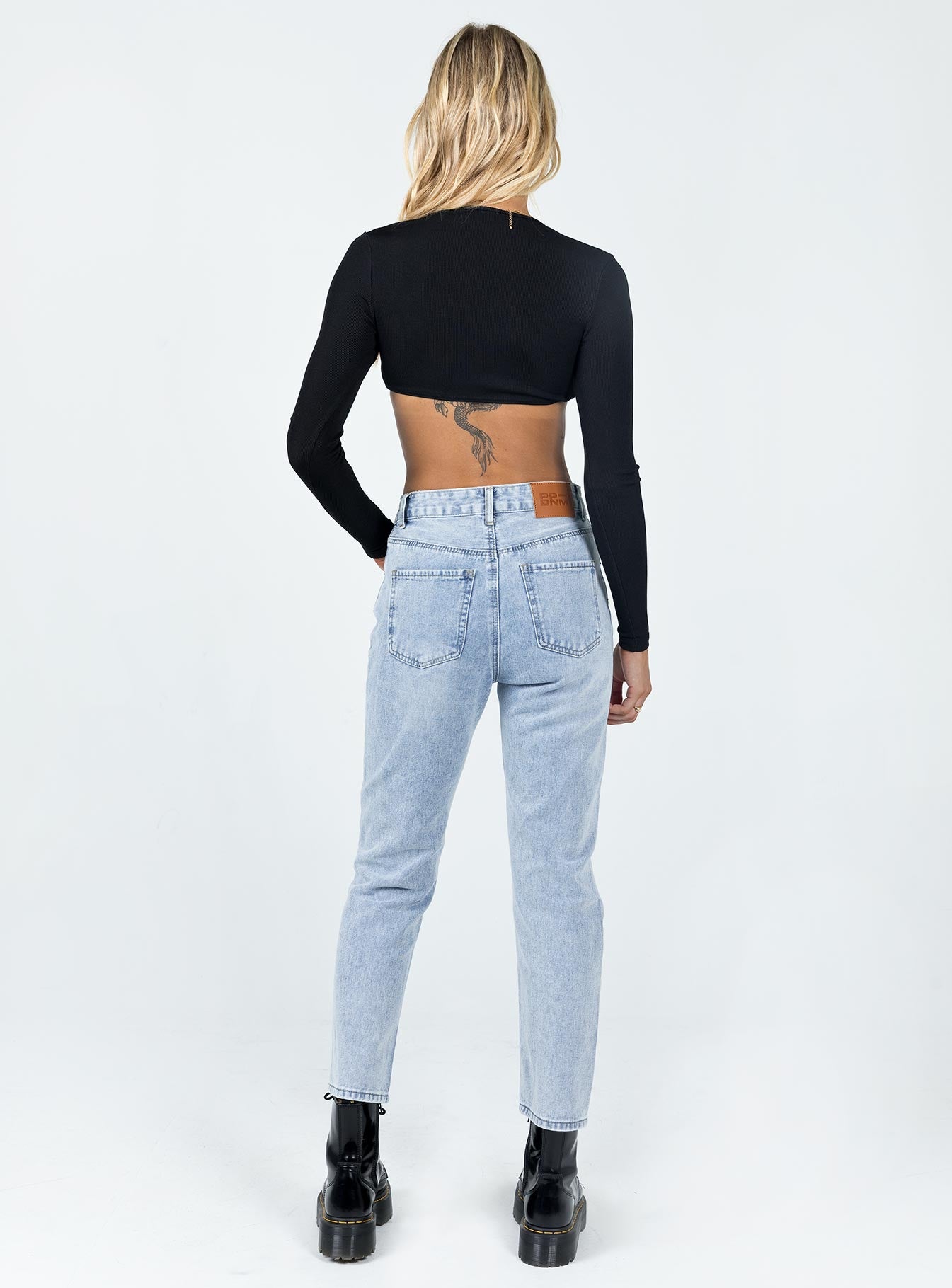 back view of model wearing Princess Polly Valencia Denim Jeans Mid Rise 