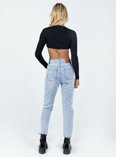 back view of model wearing Princess Polly Valencia Denim Jeans Mid Rise 