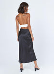 back view of model wearing Princess Polly Tyra Satin Midi Skirt Black 