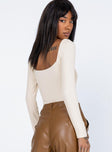 back view of model wearing Princess Polly Charlotte Bodysuit Beige Full Sleeves Square Neck 