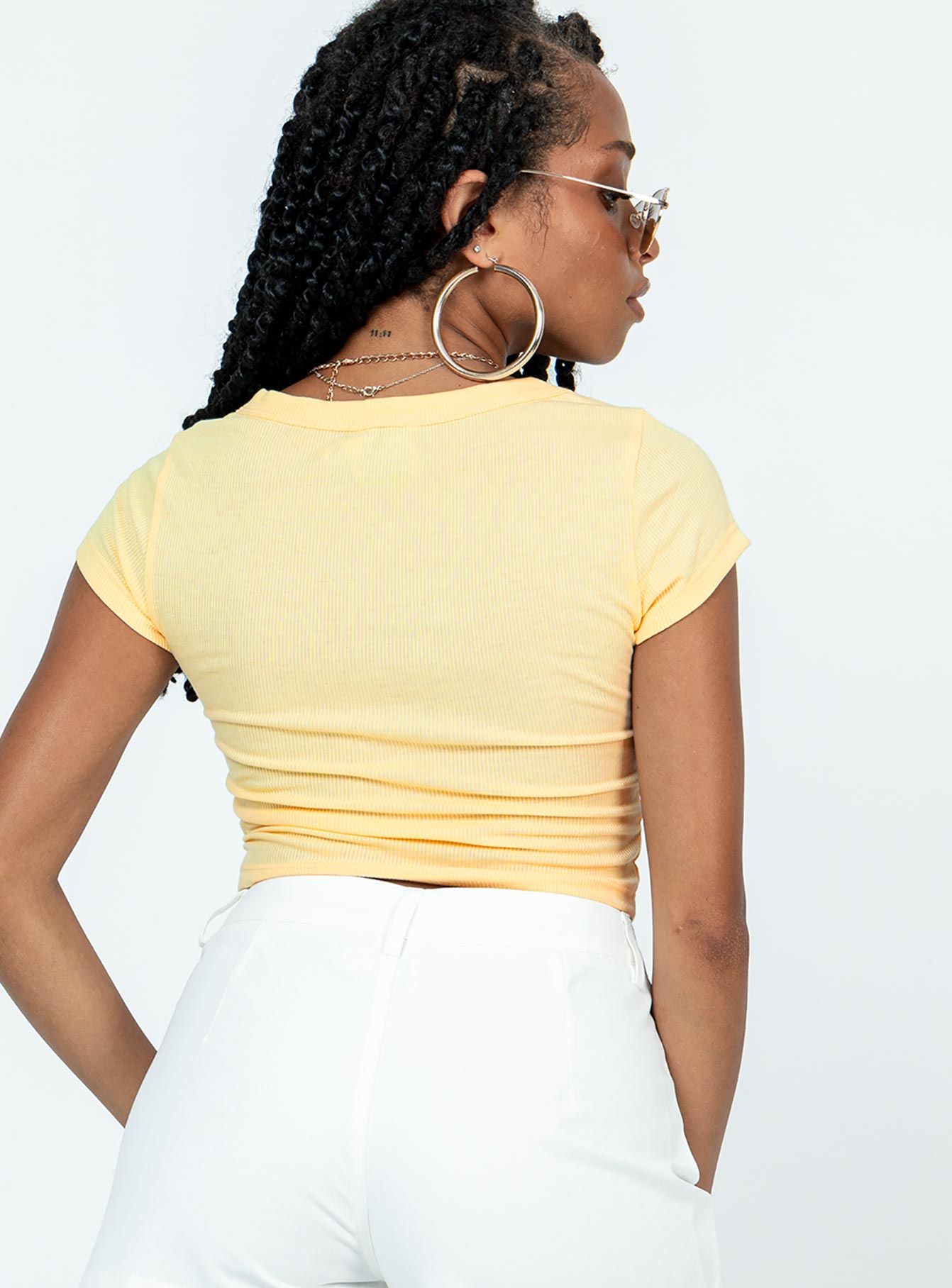 back view of model wearing Princess Polly Kerri Top Cream Short Sleeves Scoop Neck 