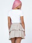 back view of model wearing Princess Polly Janet Mini Skirt Beige Mini Skirts 