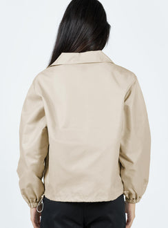 Jacket High neck Zip fastening at front Faux zip chest pocket  Twin hip pockets Drawstring waist Elasticated cuffs