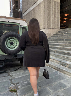 back view of model wearing Princess Polly Party Time Mini Dress Black Curve 