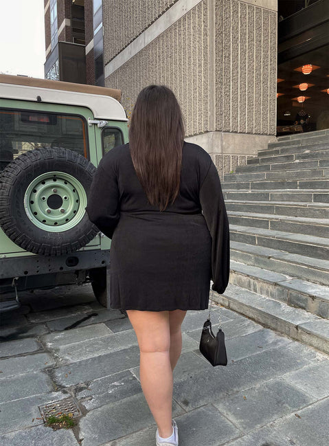 back view of model wearing Princess Polly Party Time Mini Dress Black Curve 