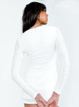 White long sleeve top Textured material  V neckline  Hook front fastening  Longline design 