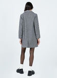 Oversized coat Houndstooth print Soft knit material Double button fastening Twin hip pockets Longline design Fully lined