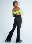 back view of model wearing Princess Polly Loriella Flare Pants Black 