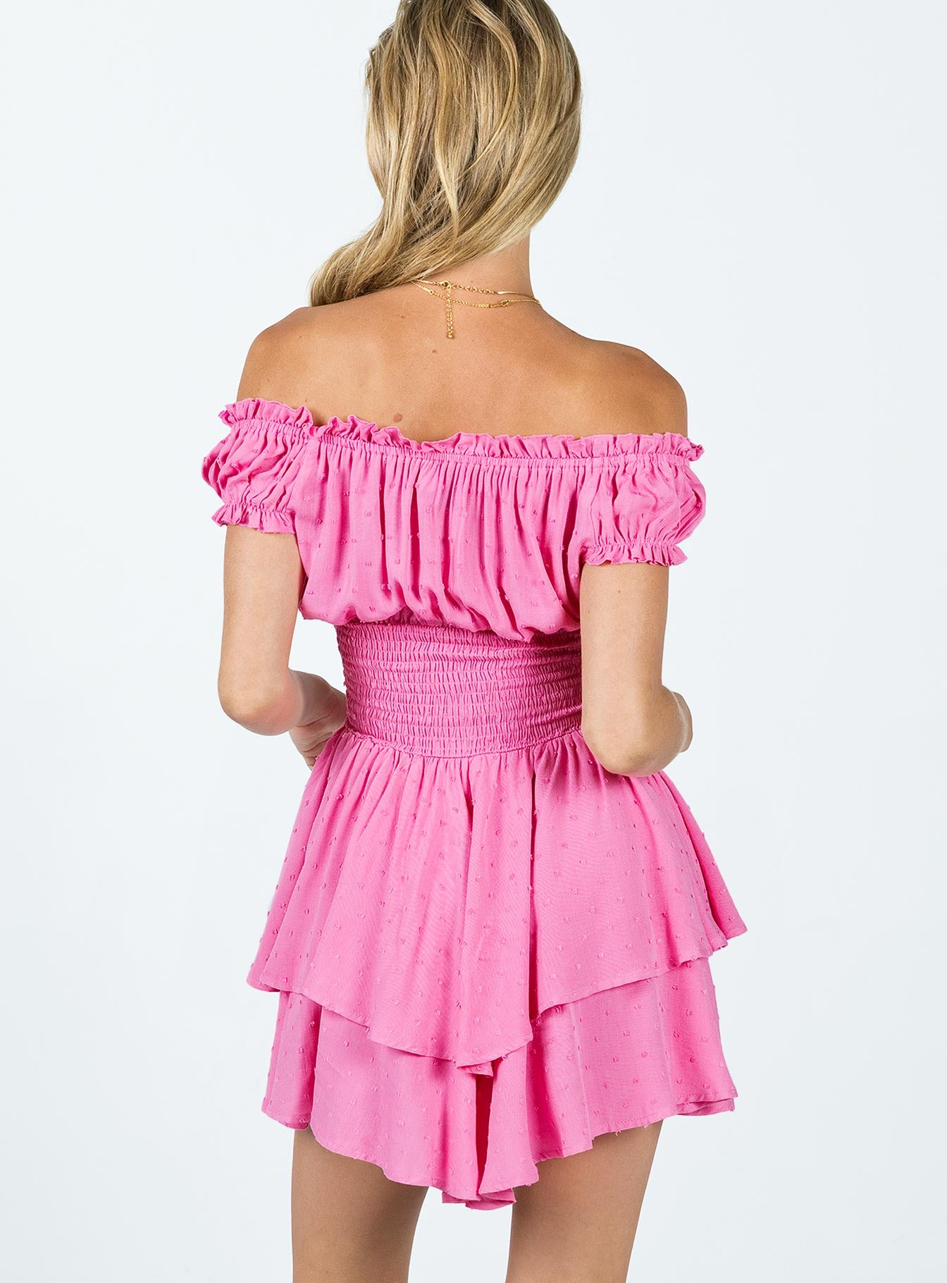 Romper Shirred waistband Ruffle detailing Elasticated neck & sleeves Can be worn on or off-shoulder