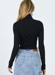 Front view of model wearing  front Princess Polly Full Sleeves High Neck  Savonna Long Sleeve Top Black