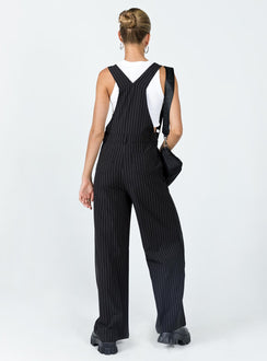 Overalls Oversized fit Pinstripe print  Adjustable shoulder straps  Single chest pockets  Belt looped waist  Four classic pockets  Invisible zip fastening at side  Wide leg 