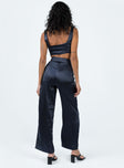 Matching set Soft silky material Crop top Fixed straps Invisible zip fasting at side High waisted pants Wide relaxed leg Belt loops at waist Zip & button fastening Lined top