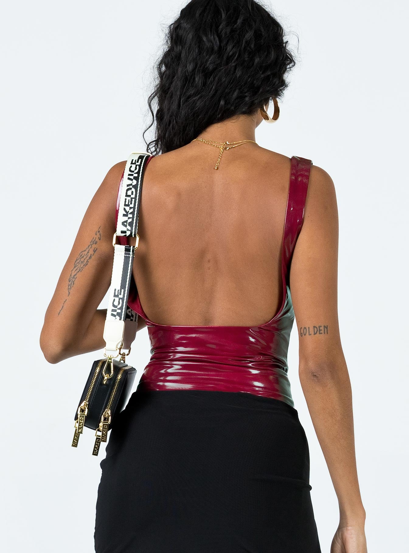 back view of model wearing Princess Polly Alderly Faux Leather Bodysuit Maroon Sleeveless Scoop Neck 