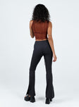 Front view of model wearing  front Princess Polly High Waisted Pants High Waisted Pants High Waisted Pants High Waisted Pants  Long Nights Flare Pants Black