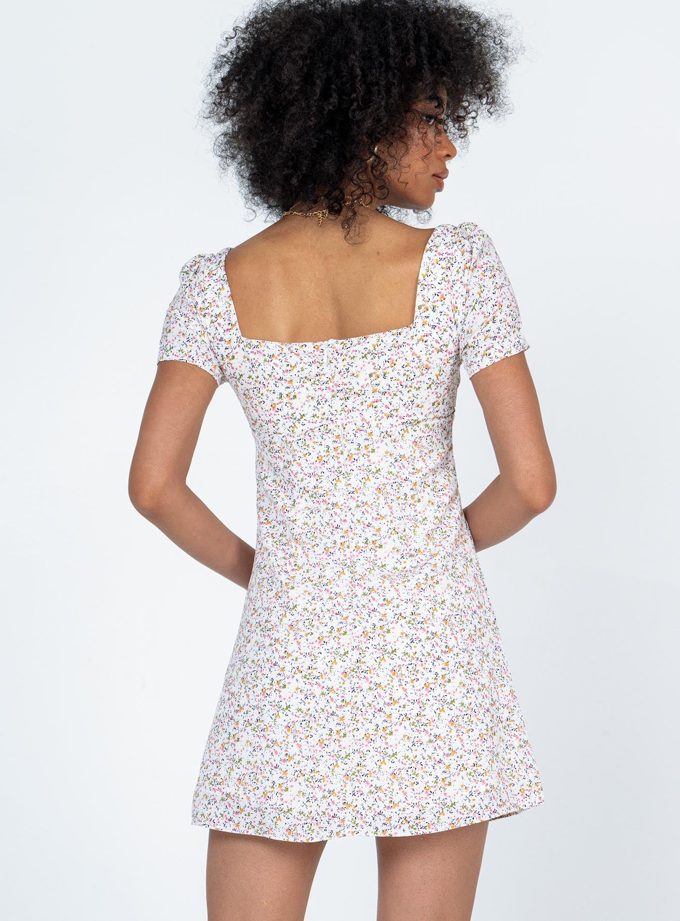 back view of model wearing Princess Polly Hastings Mini Dress White Floral 
