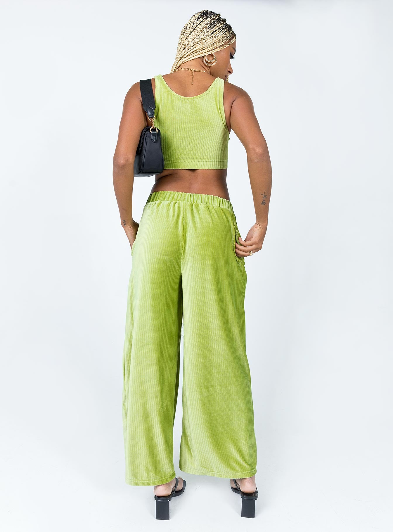 Matching set Velour material  Crop top  High waisted pants  Elasticated waistband  Twin hip pockets  Wide leg 