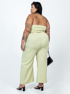 Matching set High waisted pants  Zip & button fastening  Elasticated back band  Belt looped waist  Twin hip pockets Wide leg  Vest top  Lapel collar  Button front fastening 