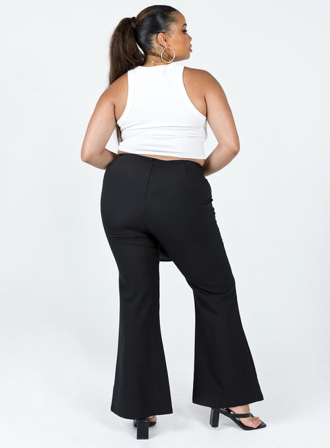 back view of model wearing Princess Polly Lovey Pants Black Curve 