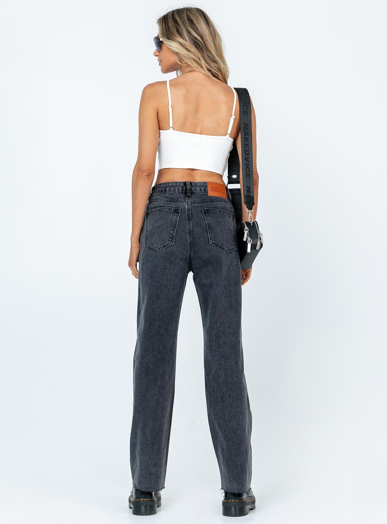 Front view of model wearing  front Princess Polly High Waisted  Arlington Straight Leg Denim Jeans Black