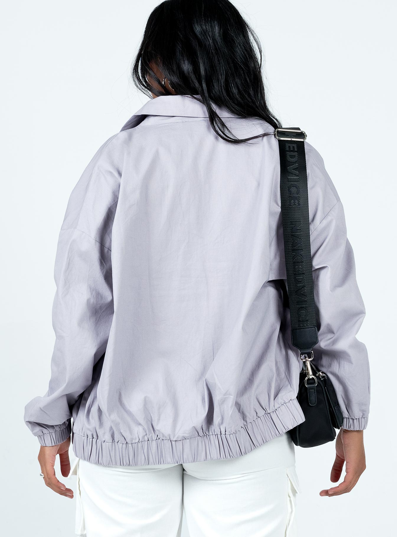 Relaxed fit jacket Lightweight material  Classic collar  Silver-toned hardware  Zip front fastening  Twin hip pockets  Elasticated cuffs & waistband 