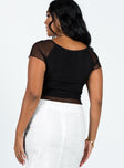 Black crop top V neckline Mesh capped sleeves Good stretch Lined body