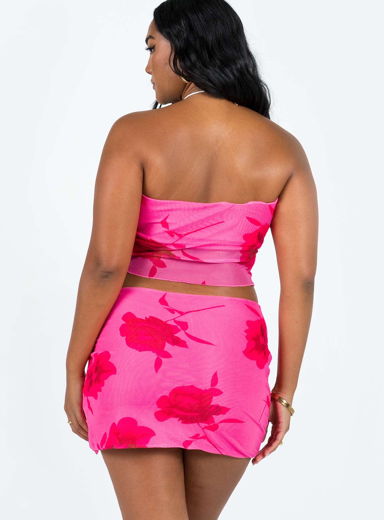 Pink matching set Mesh material Floral print Strapless crop top Inner silicone strip at bust Mini skirt Mid rise Leg slit Good stretch Fully lined 