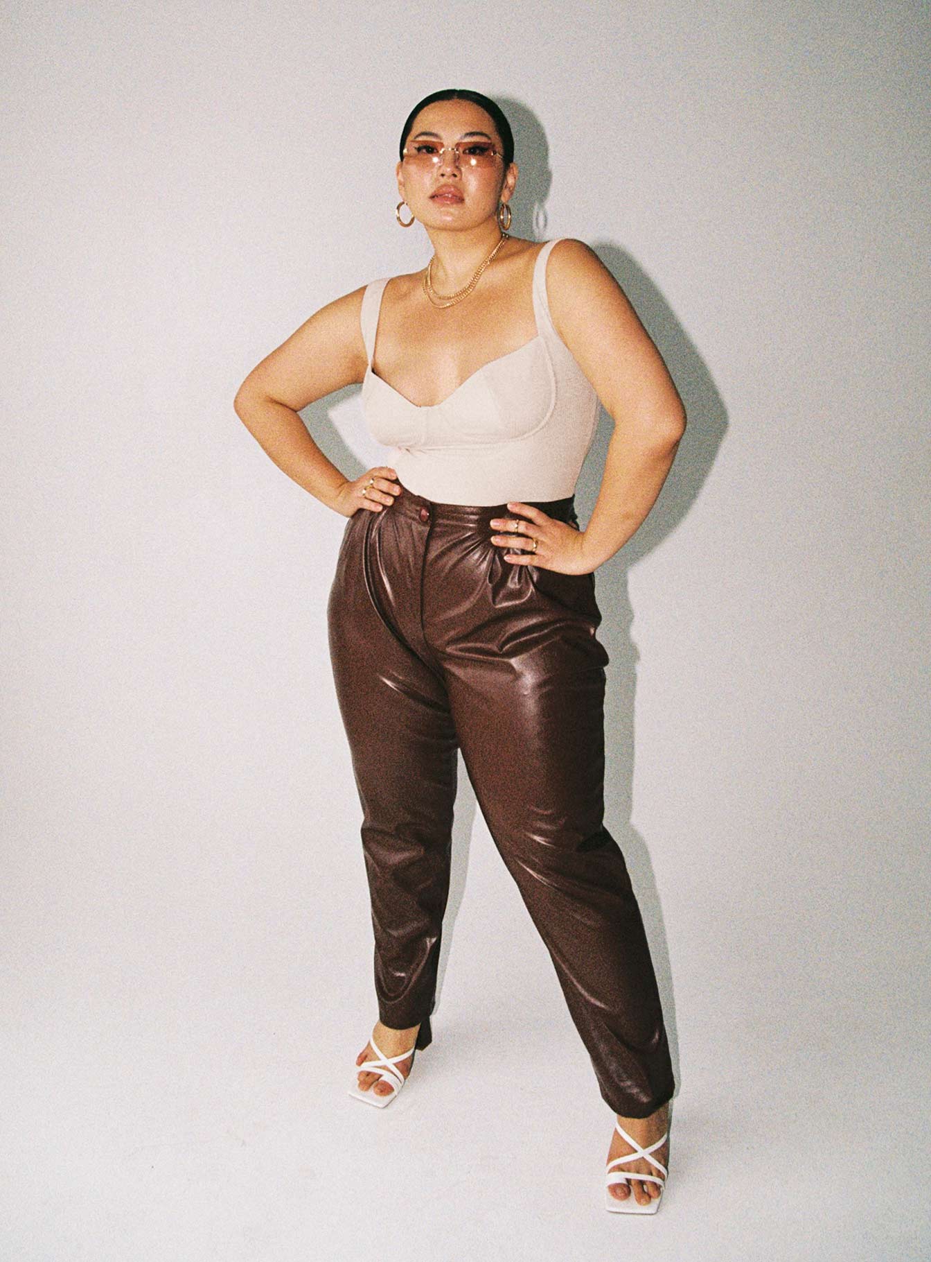 back view of model wearing Princess Polly Kloye Bodysuit Beige Curve Sleeveless Sweetheart 