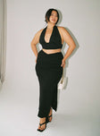   side view of model wearing Princess Polly Abigail Midi Skirt Black Curve Maxi 