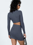 Matching set Long sleeve top Crew neckline Button detail throughout Mini skirt