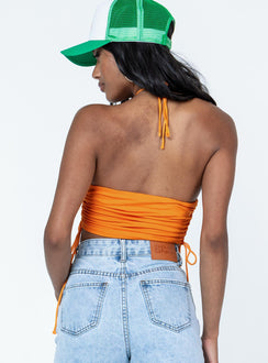 back view of model wearing Princess Polly Jenson Top Orange Sleeveless Asymmetric Neckline 