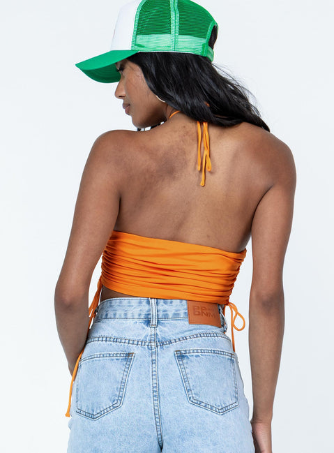 back view of model wearing Princess Polly Jenson Top Orange Sleeveless Asymmetric Neckline 