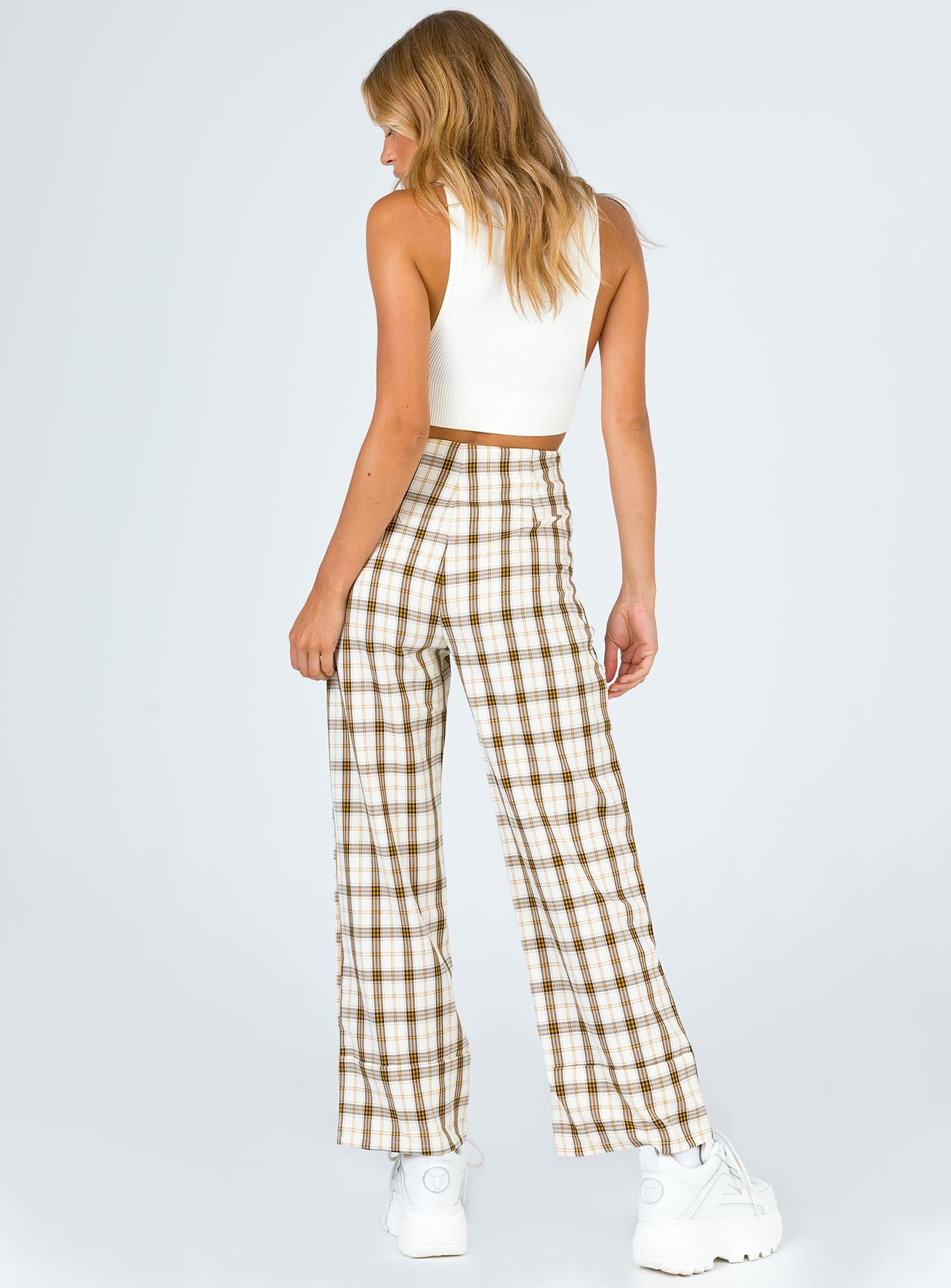 back view of model wearing Princess Polly Euros Pants Yellow Check 