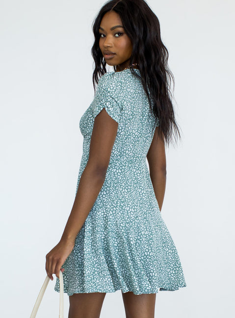 back view of model wearing Princess Polly The Sting Mini Dress Green Leopard 