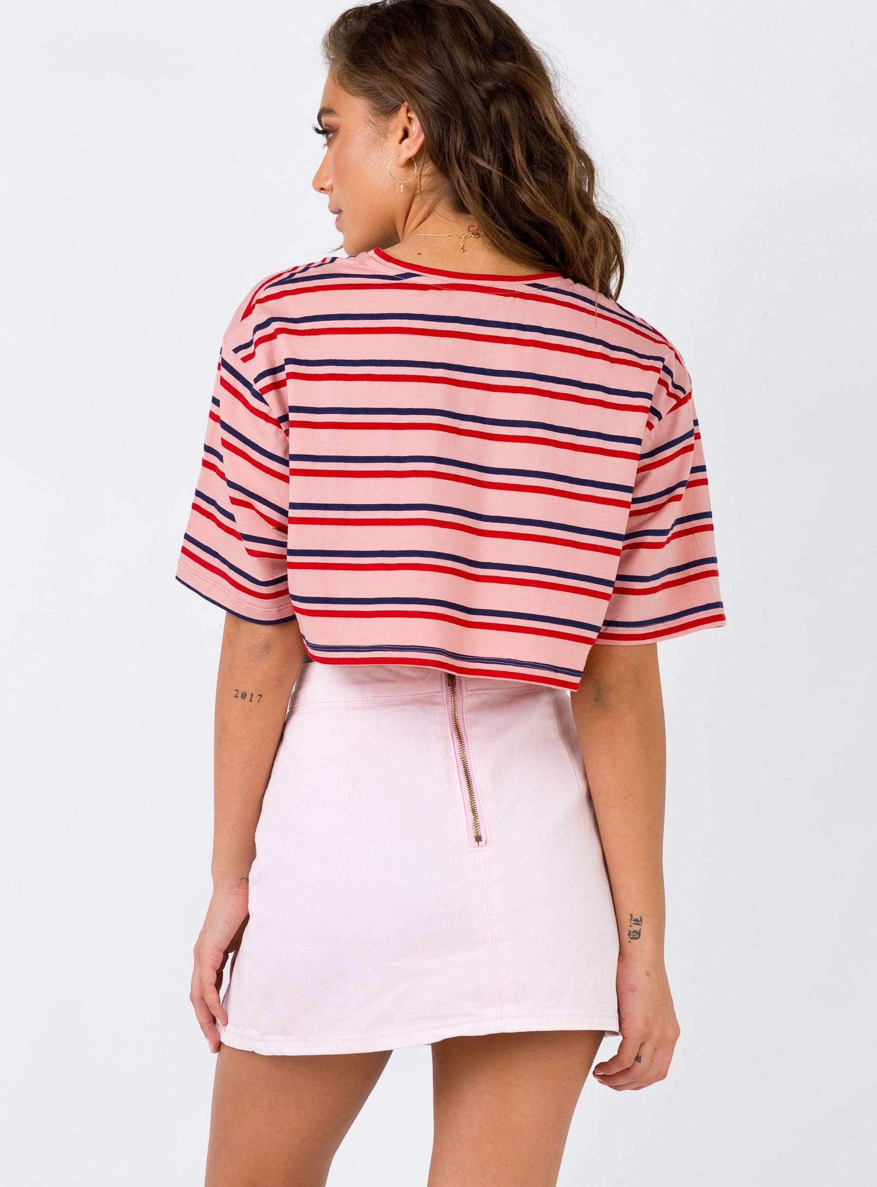 back view of model wearing Princess Polly The Lola Mini Skirt Pink 