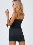 Front view of model wearing  front Princess Polly Asymmetric Neckline  Reeva Mini Dress Black